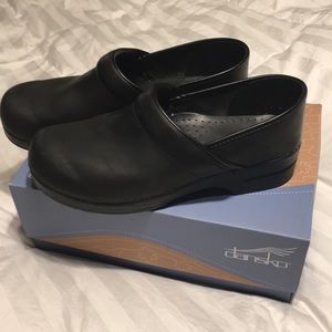 Dansko black professional oiled clogs